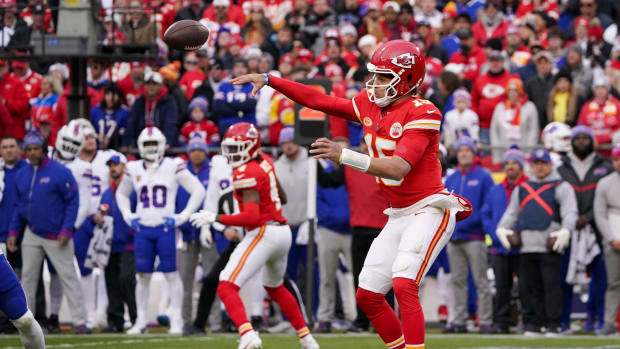 Dec 10, 2023; Kansas City, Missouri, USA; Kansas City Chiefs quarterback Patrick Mahomes (15) throws a pass against the Buffalo Bills during the first half at GEHA Field at Arrowhead Stadium. Mandatory Credit: Denny Medley-USA TODAY Sports  